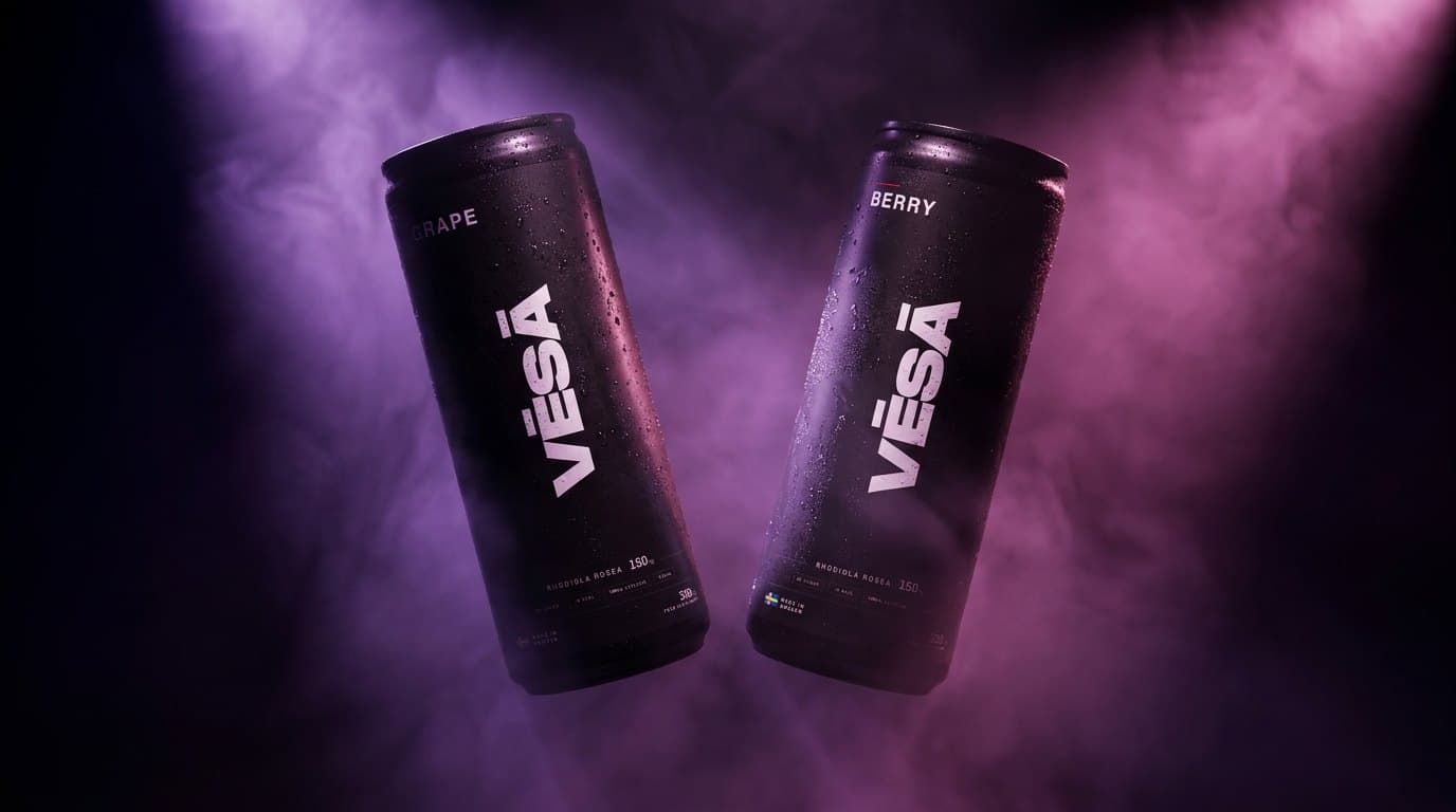 Two VĒSĀ cans in violet haze